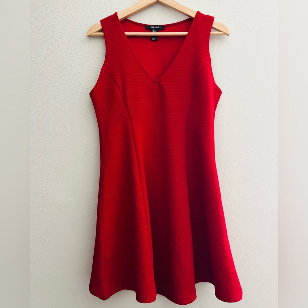 Little vibrant red mini dress that speaks volumes.